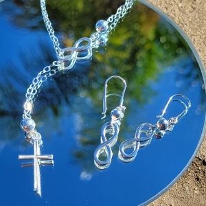 🆕️Infinity ♾️ and cross necklace with matching earrings 🤍